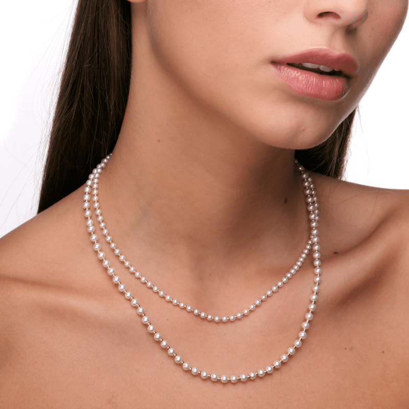 COLLANA IN MADREPERLA E SFERE IN ACCIAIO PVD ORO
