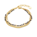BRACCIALE DORATO TRIPLO FILO CON PERLINE NERE