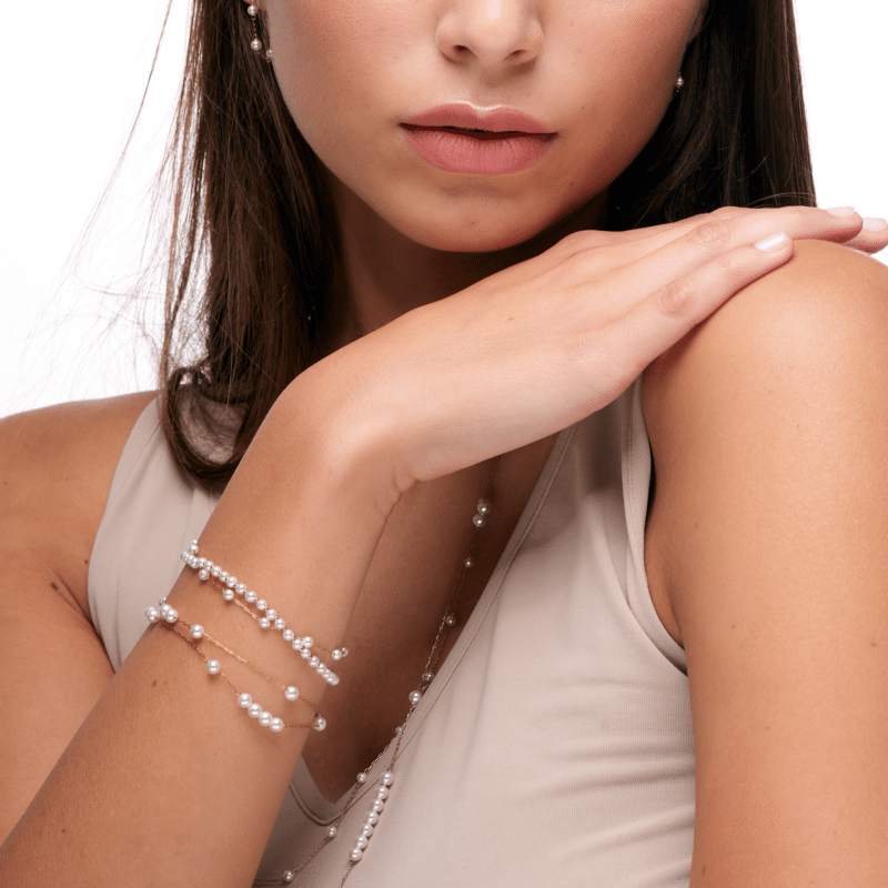 BRACCIALE IN MADREPERLA ED ACCIAIO PVD ORO