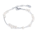 BRACCIALE IN MADREPERLA SFERE SFALSATE