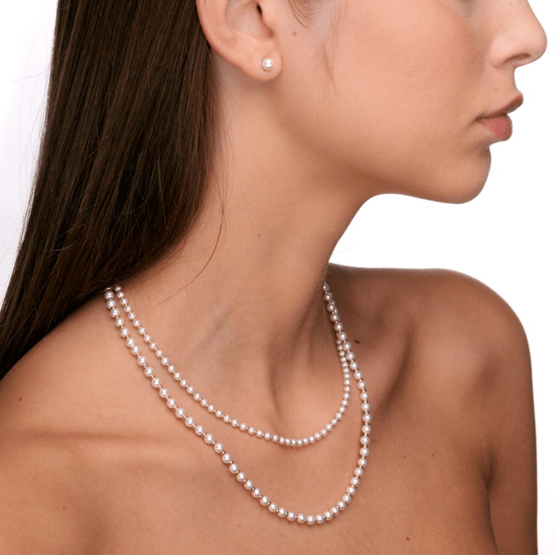 COLLANA IN MADREPERLA E SFERE IN ACCIAIO PVD ORO