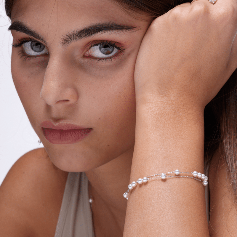BRACCIALE IN MADREPERLA SFERE SFALSATE PVD ORO